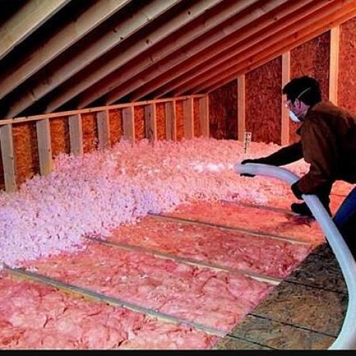 roofer-installing-an-attic-insulation roofer-installing-an-attic-insulation